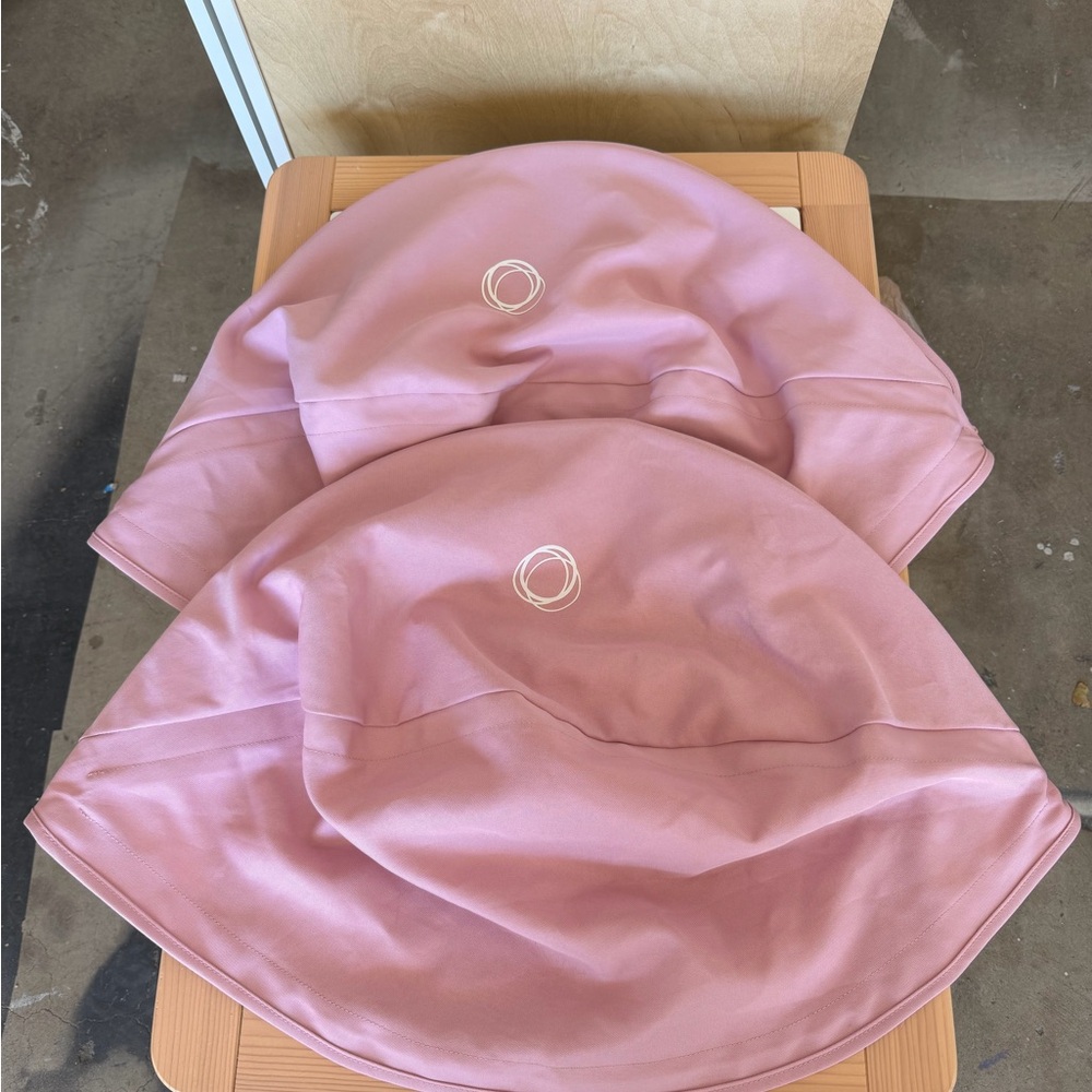 Pink bugaboo donkey canopies